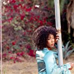 Fourth pic of Misty Stone exposes her small boobs and juicy ass on a swing