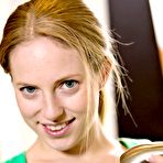 Second pic of Playful small titted teen girl Amber Grand in panties plays with water in the kitchen