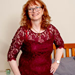 First pic of Naughty mature lady playing with her pussy in bed
