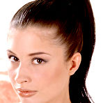 First pic of Lotti exposes her bare feet and pussy after she peels off her black pantyhose