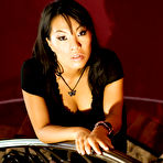 First pic of Asa Akira Asa Akira poses in black lingerie on a dark lovely staircase.