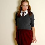 First pic of Four-eyed school chick Kat flashes her sexy tits and pussy while posing