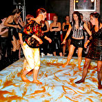 Third pic of Two clothed messy wrestlers Mila Dark and Lucy Cornet have fun in front of female audience