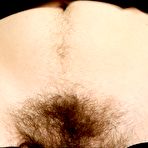 Second pic of Hairy Olivia spreads her bush