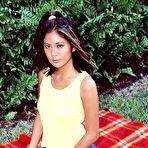 First pic of Asian babe Leilani has a picnic where she strips her tits and mink and climbs on white dildo.