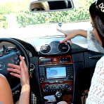 First pic of Busty Natalia Cruze and small titted Samantha get wet and horny after washing a car.