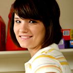 First pic of Naughty teenage girl Angie Dove strips and demonstrates her shaved snatch in the laundry room