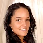 First pic of Classy brunette Latina Esmeralda strips black bra and rosy pantyhose to play with her nude body.