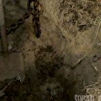 Second pic of SexPreviews - Abigail Dupree in a cage outdoors and digging a hole is dominated by her master