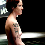 First pic of Inked redhead Nina shows how easy it is to defeat sexy wrestler Isis Love