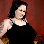 First pic of Tattooed bulky slut Glory Foxxx strips down to her panties and gets her mouth fucked