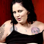 Second pic of Tattooed bulky slut Glory Foxxx strips down to her panties and gets her mouth fucked