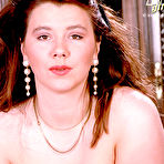 Third pic of Elegant BBW model Michaela in white lingerie exposes her big breasts and beaver