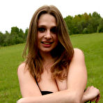 Second pic of Slightly chubby hottie with big boobs strips outdoors