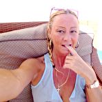 Second pic of Natalie K Spreading and fingering outside