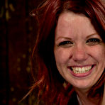 Fourth pic of Tight red-haired slave girl Lilla Katt gets spreadeagled on the floor and tickled.