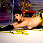 Second pic of Brooklyn Gray shows off her big butt and breasts wearing black boots and gloves