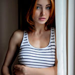 First pic of Well build beautiful redhead woman posing nude near the window