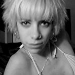 Second pic of Punk chick strips naked while selfshooting