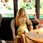 First pic of Rachel Evans in golden dress and Hana Black in pink one pour wine on each others breasts
