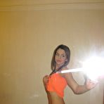 Second pic of Astonishing skinny brunette flashes her juicy titties at HomeMoviesTube.com