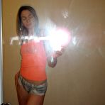 Fourth pic of Astonishing skinny brunette flashes her juicy titties at HomeMoviesTube.com