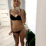 Third pic of Horny blonde loves showing off her bust at HomeMoviesTube.com