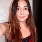 Fourth pic of Hot asian teacher tries on sexy lingerie on camera at HomeMoviesTube.com