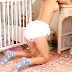 Third pic of "Secret diaper girl posing topless by royaldressedladies"