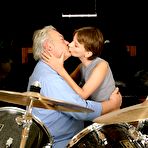 Second pic of Teenie tasting the cumload from a grey old male drummer naked