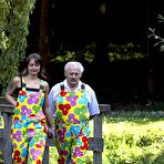 First pic of Crazy old fellow shagging a young teenage beauty outdoors naked