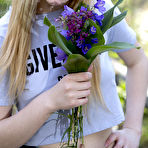 Second pic of Hottest Stunning blonde babe wearing cute glasses strips naked in the woods and shows us her sweet natural tits. by ShavedTeenGirls.com