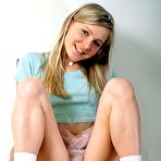 Third pic of Good looking teenager on a chair masturbates her wet pussy naked