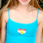 First pic of Caressing her young teenage body with her slippery hands naked