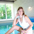 Third pic of An older guy is laying by the pool but gets a hot surprise! naked