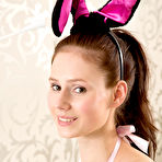 Second pic of Hottest Ears and a fluffy tail looks pretty amazing on this all natural hottie and its especially hot when she shows her pussy off. by ShavedTeenGirls.com