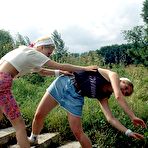 Fourth pic of Horny sport loving lesbian babes eating their wet cunts naked