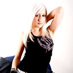 First pic of Inked up chick Elouise takes off her top to show her lovely shapely tits
