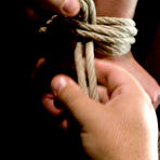 First pic of Curvacious big racked slave milf Christina Carter getting rope tied by bondage master