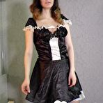 Second pic of Hot brunette maid shows off her sexy legs - AmateurPorn