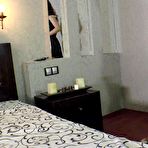 Third pic of Hot brunette maid shows off her sexy legs - AmateurPorn