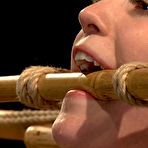 Third pic of Cute rope bound brunette Charlotte Vale gets double dildoed by John Henry