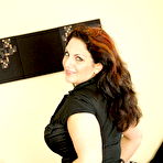 First pic of Big titted tattooed BBW woman Mellie D gets naked and dildos her hairless pussy