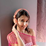 First pic of Teen charmer takes her white underwear off on her girly pink bed