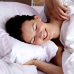 First pic of Iva sensually poses on the bed as she bares her petite body.