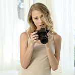 First pic of New model Riley Anne flaunts her delectable body with perky tits in the living room. naked