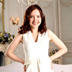 Second pic of Newcomer Lizette flaunts her creamy, slender body and sweet pussy on the couch. naked