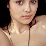 Fourth pic of Anatali shows off her beautiful tits and sweet pussy on the chair.