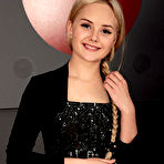 First pic of Isabella Star strips on the red couch baring her delectable pussy. naked