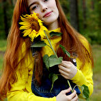 First pic of Redhead Jia Lissa strips outdoors as she displays her trimmed pussy. naked